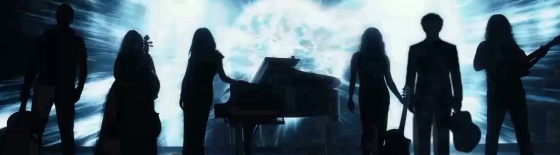 Silhouettes of the six Six String Symphony artists on stage